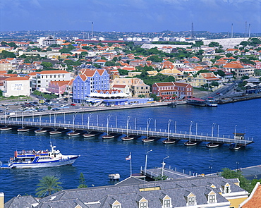 Aerial view over St. Anna Bay, with the Queen Emma Bridge open for boats to pass through, Willemstad, Curacao, Netherlands Antilles, West Indies, Caribbean, Central America