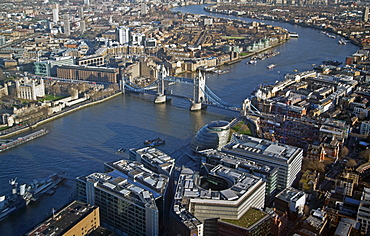 Aerial view from the top of the Shard towards Tower Hill showing the River Thames bend, Tower Bridge, The Tower of London, City Hall and More London Riverside, London, England, United Kingdom, Europe