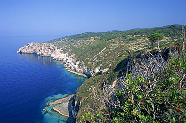 Coastline with headland in the background, at Sterna Bay, Paxos, Ionian Islands, Greek Islands, Greece, Europe