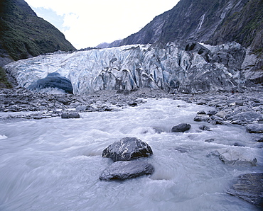 Melt water and glacial rock terrain at glacier terminus, Waiho River, Franz Joseph Glacier, Westland National Park, South Island, New Zealand, Pacific