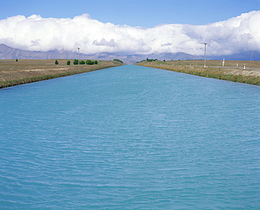 Hydro canal between Lakes Tekapo and Pukaki in a hydro-electric power scheme in Canterbury, South Island, New Zealand, Pacific