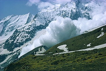 An avalanche on Hiunchuli in the Himalayas in Nepal, Asia