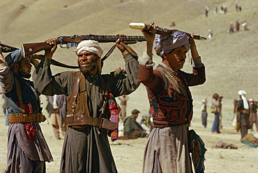 Pushtoon tribesmen dancing at Jeshan celebration, Bamiyan, Afghanistan, Asia