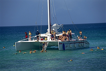 Catamaran taking tourists to the reef, Aruba, West Indies, Caribbean, Central America