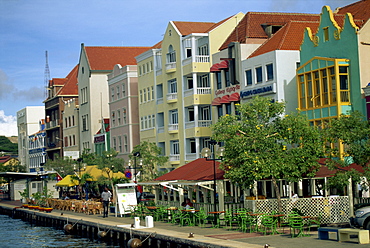 Waterfront buildings with outdoor cafes and bars, Willemstad, Curacao, Antilles, West Indies, Caribbean, Central America