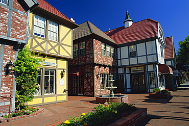 Timber frame houses and fountain showing Danish influence in a typical street in Solvang, California, United States of America, North America