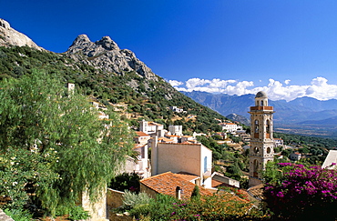 View across rooftops of the village of Lumio, Balagne, Corsica, France, Europe