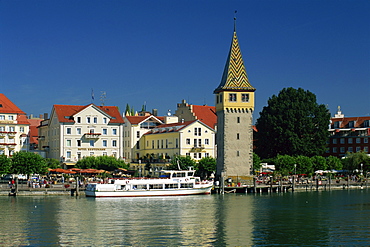 The 13th century Mangturm (lighthouse) viewed across harbour, Lake Constance,