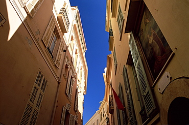 Narrow street adorned with painting, Monaco-Ville, Monaco, Mediterranean, Europe