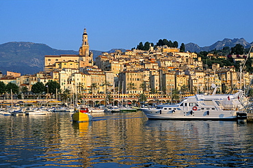 Fishing boat leaving harbour, Menton, Alpes-Maritimes, Cote d'Azur, Provence, French Riviera, France, Mediterranean, Europe