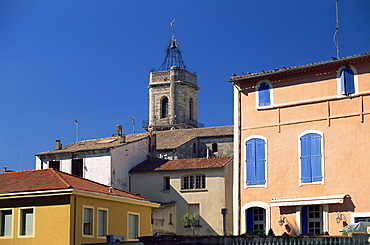 View from the Place du 14 Juillet to the tower of the Christian church of St. Jean, Pezenas, Herault, Languedoc-Roussillon, France, Europe