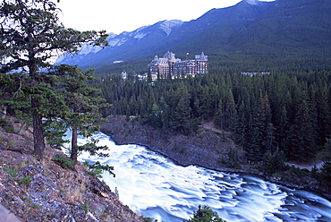 Banff, the Bow Falls and prestigious Banff Springs Hotel, at dusk, Banff National Park, UNESCO World Heritage Site, Alberta, Canada, North America