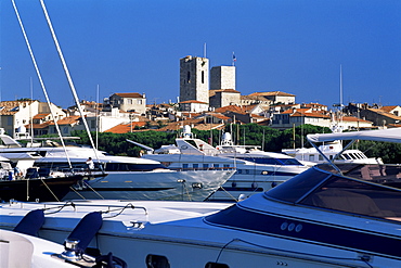 Old Town beyond yachts in Port Vauban marina, Antibes, Alpes-Maritimes, Cote d'Azur, French Riviera, Provence, France, Europe