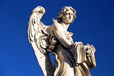 One of Gian Lorenzo Bernini's 17th century stone angels on the Ponte Sant'Angelo, Rome, Lazio, Italy, Europe