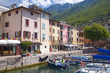 Colourful harbourside houses in the village of Brenzone on the eastern shore of Lake Garda, Verona, Veneto, Italy, Europe