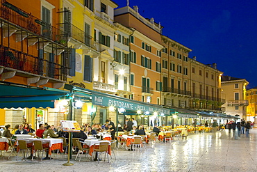 Typical restaurants overlooking Piazza Bra after dark, Verona, Veneto, Italy, Europe