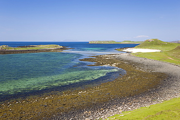 View over shore at low tide to distant Coral Beach, Claigan, near Dunvegan, Isle of Skye, Inner Hebrides, Highland, Scotland, United Kingdom, Europe