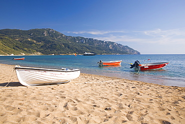 View from the beach to distant Cape Taxiarhis, Agios Georgios, Corfu, Ionian Islands, Greek Islands, Greece, Europe