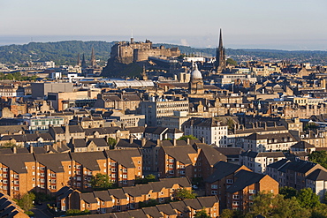 View from Holyrood Park over city rooftops to Edinburgh Castle, Edinburgh, City of Edinburgh, Scotland, United Kingdom, Europe