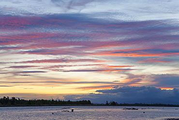 Pink clouds over the Wairau River estuary at dusk, Wairau Bar, near Blenheim, Marlborough, South Island, New Zealand, Pacific