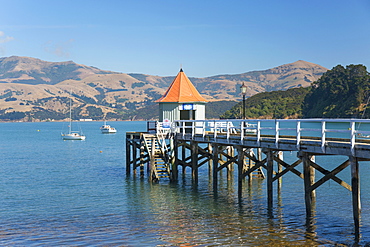 Daly's Wharf, an historic jetty overlooking Akaroa Harbour, Akaroa, Banks Peninsula, Canterbury, South Island, New Zealand, Pacific