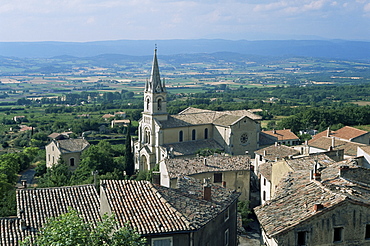 View over village and church to Luberon countryside, Bonnieux, Vaucluse, Provence, France, Europe