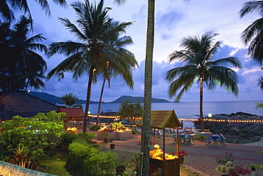 Beach restaurant at dusk, Patong, Phuket, Thailand, Southeast Asia, Asia