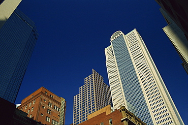 Old brick building contrasts with modern skyscrapers in Dallas, Texas, United States of America, North America