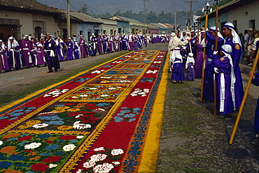 Penitents and street rug, La Merced, Good Friday of Easter Week, Antigua, Guatemala, Central America