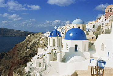 View over the blue domes and white houses of the village of Oia, Santorini (Thira), Cyclades Islands, Greek Islands, Greece, Europe