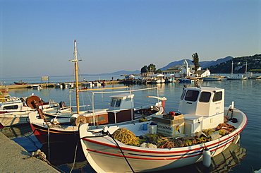 Moored fishing boats before Vlacherna Monastery, Kanoni, Corfu, Ionian Islands, Greek Islands, Greece, Europe