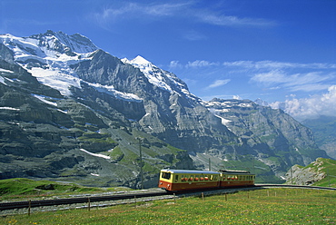 The Jungfrau railway with the Jungfrau, 13642ft, beyond, in the Bernese Oberland, Switzerland, Europe