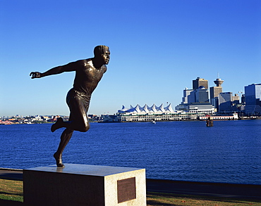 H W Jerome statue with the city skyline of Vancouver in the background, British Columbia, Canada, North America