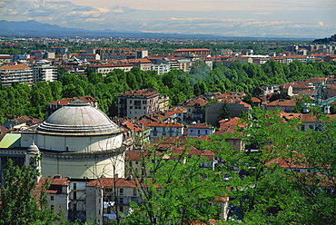 Skyline of north east of the city, with trees lining the River Po, in Turin, Piemonte, Italy, Europe