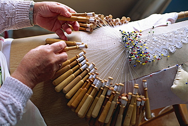 Close-up of the hands of a palilleira, a lace maker, in the famous lace making village of Camarinas in Galicia, Spain, Europe