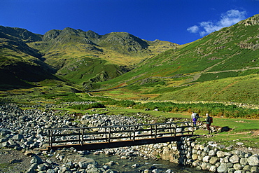 Footbridge over Oxendale Beck near Crinkle Crags, Lake District National Park, Cumbria, England, United Kingdom, Europe