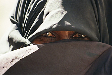 Veiled woman, Lamu, Kenya, East Africa, Africa