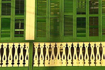 Detail of facade of a wooden colonial building in Belize City, Belize, Central America