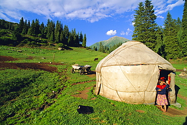 Little girl outside yurt, Altyn-Arashan near Kara-Kol, Kyrgyzstan, Central Asia