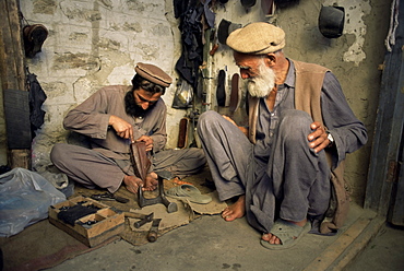 The shoe repair shop, Gilgit, Pakistan, Asia