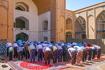 Men praying, Men's Section, Jameh Mosque, Varzaneh, Iran, Middle East