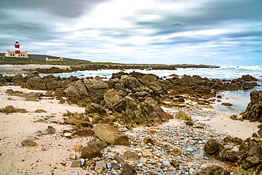 Lighthouse and bay at the southernmost tip of Africa, Cape Agulhas, Western Cape, South Africa, Africa