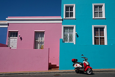 Brightly coloured houses with painted scooter in front, Waal Street in Bo-Kaap, the Malaysian and Muslim area, Cape Town, South Africa, Africa