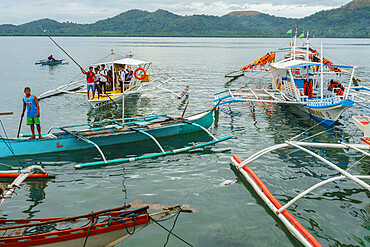 Early morning bangka taxis (outrigger canoes), Coron Harbour, Busuanga island, Philippines, Southeast Asia, Asia