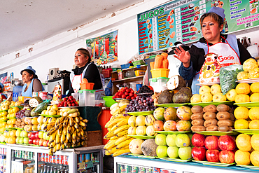 Line up of fruit and juice sellers, main market, Sucre, UNESCO World Heritage Site, Bolivia, South America