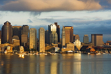 The skyline of the Financial District across Boston Harbor at dawn, Boston, Massachusetts, USA