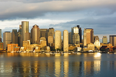 The skyline of the Financial District across Boston Harbor at dawn, Boston, Massachusetts, USA