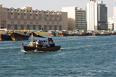 An abra (ferry) crossing Dubai Creek, Dubai, United Arab Emirates, Middle East