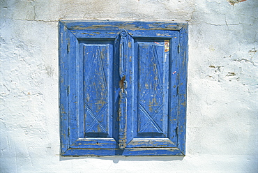 Blue window shutters and white walls, Simi (Symi), Dodecanese Islands, Greek Islands, Greece, Europe