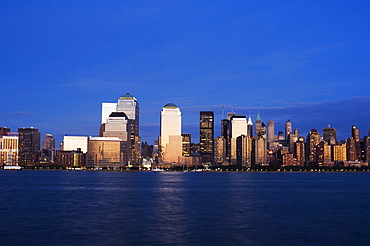 Lower Manhattan skyline at dusk across the Hudson River, New York City, New York, United States of America, North America